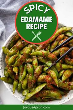 spicy edamame recipe in a bowl with chopsticks