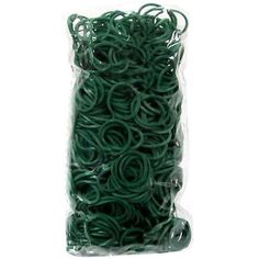 green rubber bands in plastic bag on white background