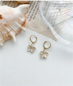 jury Pure Pearl Flower Earring | Earrings for Women | KOODING Flower Shaped Hoop Earrings For Gift, Trendy Flower Earrings For Gift, White Flower Hoop Earrings For Spring, Everyday Spring Earrings, Spring Everyday Earrings, Spring Flower Earrings For Everyday, Everyday Summer Flower Earrings, Everyday Flower Earrings With Charm For Spring, Everyday Flower Charm Earrings For Spring