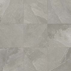 a tile floor with different shades of gray