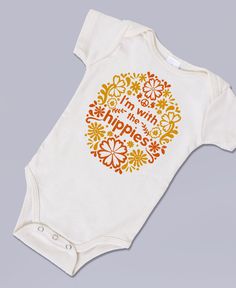 Show off your hippie baby in this "I'm with the Hippies" onesie. Your little one will always be a hippie at heart wearing this onesie and sending out good vibes all day long! Three snap front closure. Made in the USA. 100% organic cotton. Natural. Hippy Baby, Onsies Ideas, Hippie Baby Clothes, Hazel Grace, Hippie Baby, Ivy Vine, Baby Outfits, Baby & Toddler Clothing, Organic Baby