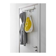 a coat rack with two bags hanging from it's hooks, and a bag on the door handle