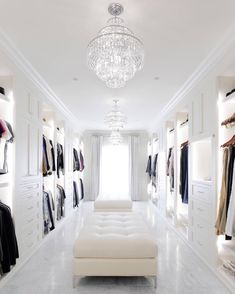 a white room with lots of closet space