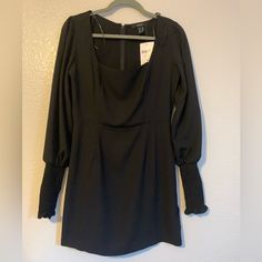 Square Neck Line And Long Sleeve With Elasticized Wrist. Has A Hidden Back Zipper. Waist Measures About 14.5 Inches Across And Dress Is About 31 Inches Long. New With Tags. Originally $22.99 Usd Forever 21 Long Sleeve Mini Dress For Date Night, Forever 21 Black Mini Dress For Brunch, Chic Long Sleeve Mini Dress By Forever 21, Forever 21 Long Sleeve Trendy Mini Dress, Black Long Sleeve Dresses By Forever 21, Forever 21 Long Sleeve Dress For Date Night, Forever 21 Chic Long Sleeve Mini Dress, Forever 21 Long Sleeve Dresses For Night Out, Forever 21 Black Long Sleeve Dress