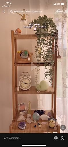 a wooden shelf filled with lots of plants