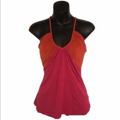 Wear This Stylish Top To A Date, Girls Night Out, Or Any Special Occasion Or Casual Gathering! This Red Orange And Raspberry Red Top Features A Unique Back Design. Pair With Your Favorite Jeans, Leggings, Skirt Or Shorts. Perfect For Spring And Summer Weather! Brand: Fighting Eel Material: 92% Modal, 8% Spandex Condition: New Without Tags (Nwot) Measurements: 15.5 Inches Across Pit To Pit Red Stretch Summer Tank Top, Red V-neck Color Block Tops, Red Color Block Tops For Summer, Orange Raspberry, Raspberry Red, Summer Weather, Stylish Top, Jeans Leggings, Red Top