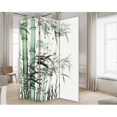 the room divider is decorated with green bamboo trees and white walls, along with beige carpeting