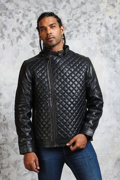 Black leather jacket with diamond quilted pattern made with real leather. This black leather quilted jacket features asymmetric zip closure, two zipper pockets on its exterior with padded sleeves and shoulders. Includes premium viscose lining and snap button collar assuring comfort and warmth. This diamond quilted jacket is one of the most timeless and total head-turner piece which can help you emphasize your casual outfits Quilted Biker Leather Jacket, Fitted Quilted Leather Jacket For Winter, Winter Leather Jacket Quilted, Quilted Biker Leather Jacket For Winter, Black Quilted Biker Leather Jacket, Black Quilted Biker Outerwear, Fitted Leather Quilted Jacket, Black Quilted Leather Biker Jacket, Quilted Leather Biker Jacket