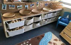 there are many baskets on the counter in this room