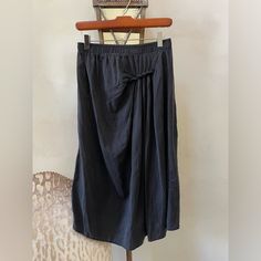 Listed For Sale Is A Beautiful Black Skirt By Designer Clu And Has Never Been Worn. The Detail Is Beautiful. Black Relaxed Fit Midi Skirt, Black Relaxed Fit Skirt With Lining, Relaxed Fit Black Gathered Skirt, Black Relaxed Fit Skirt For Spring, Black Relaxed Fit Skirt For Work, Black Relaxed Fit Skirt, Black Pleated Skirt With Relaxed Fit, Black Pleated Relaxed Fit Skirt, Black Relaxed Fit Pleated Skirt