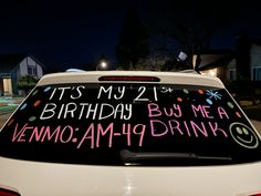 a car with a birthday message written on it