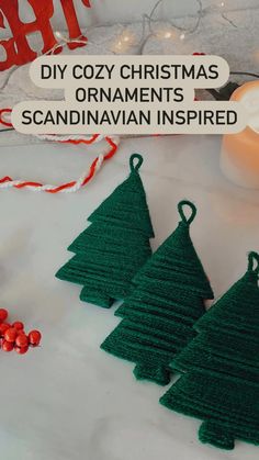 crochet christmas tree ornaments with text overlay that reads diy cozy christmas ornaments scandinavian inspired