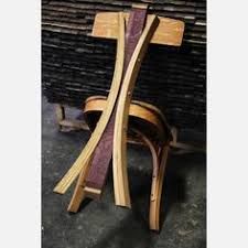 a wooden chair sitting on top of a floor