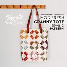 a handbag hanging on a wall with the text mod fresh granny tote sewing pattern