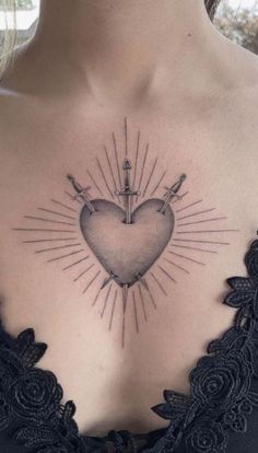 a woman with a heart tattoo on her chest