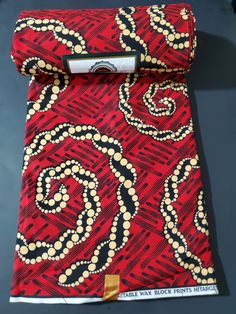 DESCRIPTION Red, Beige and Black African Ankara Fabric. This is high quality African print is 100% cotton and it's 45 inches wide. It is used for making African Clothing, African quilts, & For Home decoration. FYI: Print is Double sided. The listing is for 2yards, 3yards, 6yards and Headwrap Each piece of fabric measures: 70-72in by 45in for 2yards 105-108in by 45in for 3yards 210-216in by 45in for 6yards 70in by 22in for Head wrap If you purchase more than one yard, you will receive one continuous piece. *If you require more than what I have listed, feel free to send me email. CARE INSTRUCTIONS:•DO NOT BLEACH•Hand wash with cold water and mild soap or Dry clean•Press with warm iron on the wrong side only. Color may be different due to your monitor Red Batik Print Cotton Fabric, Red Cotton Fabric With Batik Print, Red Printed Cotton Fabric, Red Fabric With Unique Traditional Pattern, Red Cotton Fabric With Traditional Patterns, Traditional Red Cotton Fabric, Traditional Red Cotton Fabric And Notions, Red Traditional Block Print Fabric, Red Ankara Fabric With Traditional Patterns