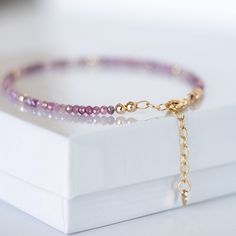 Who doesn't love Pink? Check out this gorgeous, sparkly Pink Ombre Moonstone Bracelet with a 14K gold-filled adjustable chain that includes a quality stamped heart tag. The bracelet adds just the right amount of sparkle to any outfit. It is dainty and feminine and perfect to wear solo or for stacking with our other bead bracelets.. Waterproof and tarnish resistant!  Adjustable Clasp: Whether you have a tiny wrist or need a bit more room, this bracelet fits comfortably thanks to the adjustable cl 14k Gold-filled Gemstone Bracelets, Gold Gemstone Bracelet In 14k Gold Filled, Gold Beaded Bracelets Gift For Her, Gold Beaded Bracelets As A Gift For Her, Gift Bracelets With Adjustable Chain In 14k Gold Filled, Adjustable 14k Gold Filled Faceted Jewelry, Gift 14k Gold Filled Bracelets With Adjustable Chain, Faceted Gold Beaded Bracelets As A Gift, Faceted Gold Crystal Bracelet As Gift