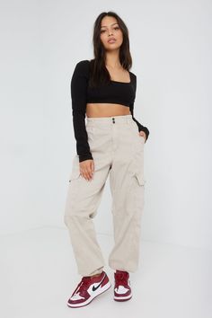 Casual is the new going out. Fall and stay in love with our super comfy bubble cargo pants. - 98% Cotton, 2% Spandex - Machine wash, cold - Relaxed fit, woven nonstretch - Elastic hem - Elastic waistband - 4 functional pockets - High rise waist: 11.25" - Button and zipper fly closure - Inseam: 30.5" - Imported Garage Clothing, Bottom Clothes, Cute Casual Outfits, Straight Leg Pants, Bottoms Pants, Cargo Pants, In Love, Going Out, High Rise