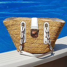 Grab This Beautiful "Santorini" Cornhusk Tote By Michael Kors. This Cornhusk Basket Tote, Is Nwt, Color Is Natural With White Leather Trim, & Chunky Michael Kors Signature Locking Clasp Hardware On Front, Accented With Leather Rings Handle With Gold Tone Hardware, The Interior Is Fully Lined With Mk Monogram Webbing Faille & Offers Multi Function Slide & Zippered Pockets. Approximate Measures: 20" W X 12" H. Luxury Beach Bag For Vacation, Luxury Summer Straw Bag For Beach, Luxury Summer Vacation Shoulder Bag, Luxury Beach Bag For Summer, Beige Straw Bag With Gold-tone Hardware For Vacation, Summer Shopping Straw Bag With Gold-tone Hardware, Luxury Straw Bag With Gold-tone Hardware For Beach, Luxury White Straw Bag For Summer, Luxury Beach Straw Bag With Gold-tone Hardware