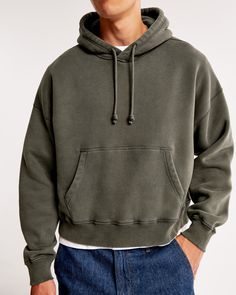 Elevate your casual wardrobe with the Abercrombie & Fitch Men's Essential Cropped Popover Hoodie. This piece combines comfort with contemporary style, perfect for any laid-back occasion.

- **Size:** XL
- **Color:** Dark Olive Green
- **Material:** Cotton, Polyester blend
- **Gender:** Male
- **Features:** Oversized, cropped fit; softAF fabric; exterior drawcords; front pouch pocket; banded hem and cuffs

Crafted in a unique dark olive green, this hoodie is made from a soft cotton-polyester blen Cotton Sweatshirt With Drawstring Hood And Drop Shoulder, Comfy Relaxed Fit Hoodie Sweats, Comfortable Relaxed Fit Hoodie Sweatshirt, Relaxed Fit French Terry Hoodie Sweatshirt, Relaxed Fit Cotton Hoodie With Drop Shoulder, Cotton Hoodie With Relaxed Fit And Drop Shoulder, Cotton Relaxed Fit Hoodie With Drop Shoulder, Trendy Relaxed Fit Sweatshirt With Kangaroo Pocket, Soft-washed Relaxed Fit Hoodie For Streetwear