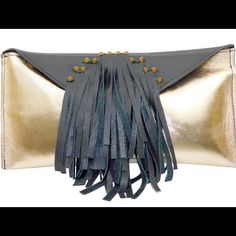 Enjoy A Night On The Town With This Beautiful Leather Clutch. With It's Eye Catching Gold Metallic Color And Pyramid Studs, You Will Be Sure To Get A Night Full Of Compliments. Constructed With 100% Genuine Leather And Lambskin. Handcrafted In The Usa. Evening Bags With Gold-tone Hardware And Calf Leather, Formal Leather Clutch With Gold-tone Hardware, Metallic Leather Bags With Gold-tone Hardware, Leather Evening Clutch With Gold-tone Hardware, Leather Pouch Clutch With Gold-tone Hardware, Design Bags, Metallic Colors, Leather Clutch, Pyramid