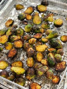 roasted brussel sprouts on a grill in an oven with oil and seasoning