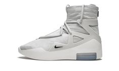 The Nike Air Fear of God 1 “Light Bone” was one of the shoes to come out of the epic collaboration between Fear of God founder Jerry Lorenzo and Nike Sportswear in late 2018.  Lorenzo’s Air Fear of God 1 “Light Bone” is constructed with a premium full-grain leather upper in an off-white shade and has a distinctive high-top silhouette.  The upper of the Light Bone colorway is built entirely in leather, in contrast from the leather and ballistic nylon combination found on the black colorway.  Blur Nike Air Fear Of God, New Nike Sneakers, Jerry Lorenzo, Balenciaga Speed Trainer, Kicks Shoes, Bone Shoes, Nike Models, Mens Nike Air, Stadium Goods