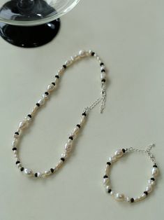 Metal: Recycled Sterling Silver Plated On Brass Pearl: Freshwater Pearls, Natural Baroque Pearls Gemstone: Black Onyx Chain Length: 380-430mm Weight: 18.5g