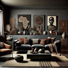 a living room filled with furniture and pictures on the wall