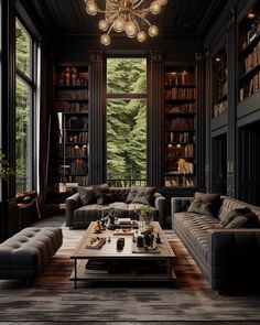 a living room filled with lots of furniture and bookshelves next to a window