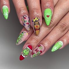 These playful nails feature bright green and nude shades with festive icons like the Grinch, reindeer, and Christmas lights. Each nail brings a unique element, adding a humorous touch to classic holiday themes. Perfect for those who want a colorful and bold winter look. Grinch Theme Nails Acrylic, Grinch Nail Tutorial, Grinch Green Nails, The Grinch Nail Designs, Short Grinch Nails Designs, Grinch And Max Nails, Grinch Almond Nails, Lime Green Christmas Nails, The Grinch Christmas Nails