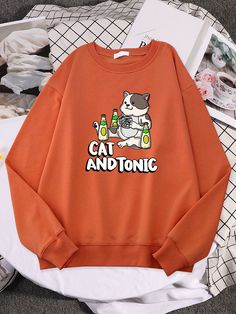 Cozy up like a cool cat in this Cat And Tonic Funny Cat Sweatshirts! Stay warm while making a statement with these Cat And Tonic Funny Cat Sweatshirts! Perfect for a night out, this sweatshirt features a cool cat sipping on some tonic (for when you need a purr-fectly balanced evening). Get your paws on one today! Casual Crew Neck Sweatshirt With Cat Print, Casual Fall Sweatshirt With Cat Print, Relaxed Fit Long Sleeve Sweatshirt With Cat Print, Casual Long Sleeve Sweatshirt With Cat Print, Casual Cat Design Sweatshirt For Fall, Trendy Winter Cat Print Sweatshirt, Trendy Winter Sweatshirt With Cat Print, Casual Cat Print Sweatshirt For Streetwear, Cute Crew Neck Sweatshirt With Cat Design