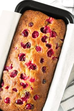 a loaf of fruit bread in a pan