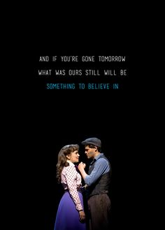 a man and woman standing next to each other in front of a black background with the words something to believe in