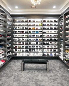 a large shoe store with lots of shoes on the shelves