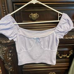 Lavender Crop Top. Xs. Never Worn Fitted Cotton Lavender Tops, Fitted Lavender Cotton Tops, Cute Lavender Cotton Top, Feminine Fitted Lavender Top, Lavender Fitted Casual Crop Top, Light Purple Crop Top, Purple Stretch Cotton Crop Top, Lavender Crop Top, Stretch Purple Crop Top With Built-in Bra