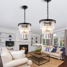 a living room with two couches and a coffee table in it's center