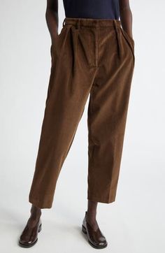 Tailored from plush corduroy, these tapered-leg pants feature reversed front pleats that create a relaxed fit. 27" inseam; 15" leg opening; 13" front rise; 16 1/2" back rise (size 42FR) Zip fly with button closure Front slant pockets; back button-welt pockets 100% cotton Dry clean Made in Italy Designer Clothing Free Fabric, Welt Pockets, Tapered Legs, Bottoms Pants, Leg Pants, Clothing Items, Womens Bottoms, Designer Clothing, Walnut