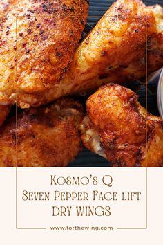 some chicken wings on a grill with the words kosmo's q seven pepper face lift dry wings