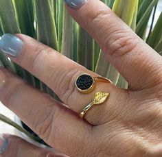 Dainty Black Druzy Stone with Gold Leaf.  Gold Band is adjustable Nickel-free Adjustable Open Crystal Ring, Adjustable Black Crystal Open Ring, Adjustable Black Midi Rings For Gift, Adjustable Black Stackable Open Rings, Leaf Ring, Ring Dainty, Gold Band, Druzy Ring, Gold Bands