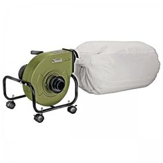 a reel and bag sitting next to each other on top of a white sheet covered cart