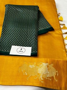 Embrace elegance with our Banarasi Mashru Raw Mango saree. This luxurious piece features a rich raw mango weave and intricate Banarasi motifs, perfect for festive occasions and celebrations. The Raw Mango brand was built from a love affair with local and traditional textiles. Defined by the use of Banarasi, Brocade and Chanderi fabrics, Raw Mango has re-explored forgotten fabrics bringing forward India's rich crafts and weaves. Elevate your ethnic wardrobe with this stunning saree! only mustard Gold Saree With Traditional Patterns In Tissue Silk, Designer Gold Saree With Traditional Patterns, Silk Pre-draped Saree In Gold With Traditional Patterns, Elegant Yellow Saree With Motifs, Gold Silk Pre-draped Saree With Traditional Patterns, Gold Traditional Wear With Motifs In Tissue Silk, Gold Tissue Silk Traditional Wear With Motifs, Gold Pre-draped Saree With Motifs For Diwali, Gold Raw Silk Saree With Motifs