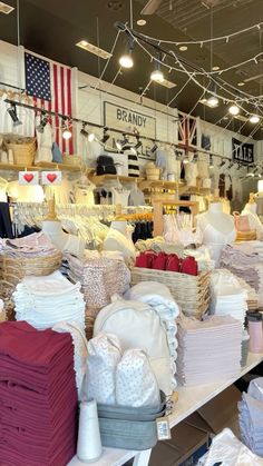 a store filled with lots of different types of cloths and other items on display