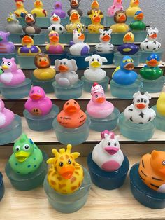 there are many rubber ducks on display