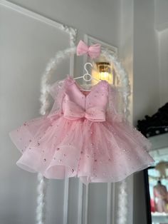 "Pink Baby Satin Tutu Wedding Girl Dress, Birthday Dress"  Make your little one's special occasions even more memorable with this exquisite Pink Baby Satin Tutu Wedding Girl Dress, Birthday Dress!  🌟 Features: 👗 Soft and luxurious satin fabric for a touch of elegance 🎀 Delicate lace embellishments for a charming look 🌸 Fluffy tutu skirt for a whimsical and adorable style 🎉 Perfect for weddings, birthdays, and any other celebrations! Let your little princess feel like the star of the event a Princess Style Dress, Baby In Wedding Dress, Pink Princess Dress, Puffy Dresses, Wedding Girl, Baby Tutu, Dress Birthday, Wedding Dresses For Girls, Dress Princess