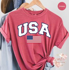 "USA Flag T-shirt, USA Shirt, America Shirt, 4th of July Shirt, American Flag Shirt, Camping USA Flag Shirt, Comfort Colors Shirt, July 4th *6.1 oz., 100% ring spun cotton *Preshrunk, soft-washed, garment-dyed fabric *Twill taped shoulder-to-shoulder *Set-in sleeves *Double-needle stitched sleeves and bottom hem *1\" ribbed collar with double-needle topstitched neckline Washing: Wash with cold/warm water Drying: Tumble dry on low heat or hang dry PLEASE NOTE: All our apparel is custom and made t Camping Usa, 4th Of July Shirt, Usa Shirt, American Flag Shirt, Comfort Colors Shirt, Flag Shirt, Flag Tshirt, Dyed Fabric, Usa Flag