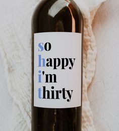 a bottle of wine that says so happy i'm thirty