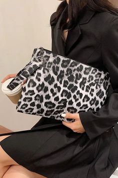 Paziye_bag_clutch bag_Leopard print Trendy Animal Design Pouch Bag, Leopard Print Pouch Shoulder Bag For Daily Use, Trendy Leopard Print Clutch Bag, Chic Zebra Print Rectangular Shoulder Bag, Black Rectangular Bags With Animal Design, Black Zebra Print Bag For Daily Use, Chic Rectangular Zebra Print Shoulder Bag, Black Zebra Print Bags For Daily Use, Chic Rectangular Shoulder Bag With Zebra Print