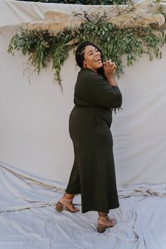 A striking and elegant dolman-sleeve, midi-length jumpsuit in a thick and luxurious fabric that beautifully skims your curves. Its flattering and bold shape is easy to wear with deep hidden side pockets, a beautifully draped wide leg bottom made with comfortable, organic cotton, stretch knit fabric. Its hidden low-dropped crotch prevents gathering and bunching. Maternity and nursing friendly with pull-down faux wrap bodice. Pre-shrunk for consistent fit wash after wash. Pre Pregnancy, Nursing Friendly, Jumpsuit With Sleeves, Sample Sale, Size 16 Dresses, Sedona, Dolman Sleeve, Luxury Fabrics, First Photo