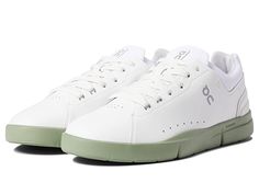 On The Roger Advantage - Men's Shoes : White/Reseda : The third tennis-inspired sneaker to join the On collection co-created with Roger Federer . With its clean lines and minimal stitching, the On The Roger Advantage sneaker demands to be added to your style rotation. Designed to add a stylish contemporary finish to any ensemble. Engineered for long-lasting cushion and comfort. Approved by the Swiss-Maestro himself. A refreshing aesthetic with athletic accents makes The Roger Advantage that esse Low-top Athleisure Tennis Sneakers, Athleisure Low-top Tennis Sneakers, Tennis Sneakers With Abzorb Midsole, Functional Low-top Golf Shoes For Streetwear, Low-top Running Shoes With Rubber Sole For Tennis, White High-top Lace-up Sneakers For Tennis, Casual Tennis Sneakers With Textured Sole, Casual Synthetic Tennis Running Shoes, Green Synthetic Tennis Sneakers